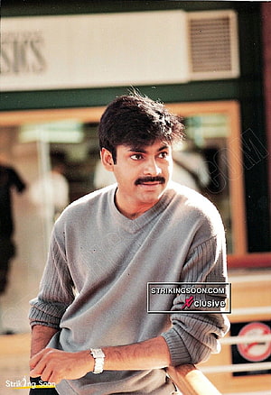 Ravi Teja in a Grey Sweater with a Mustache in a Vintage Portrait HD phone wallpaper