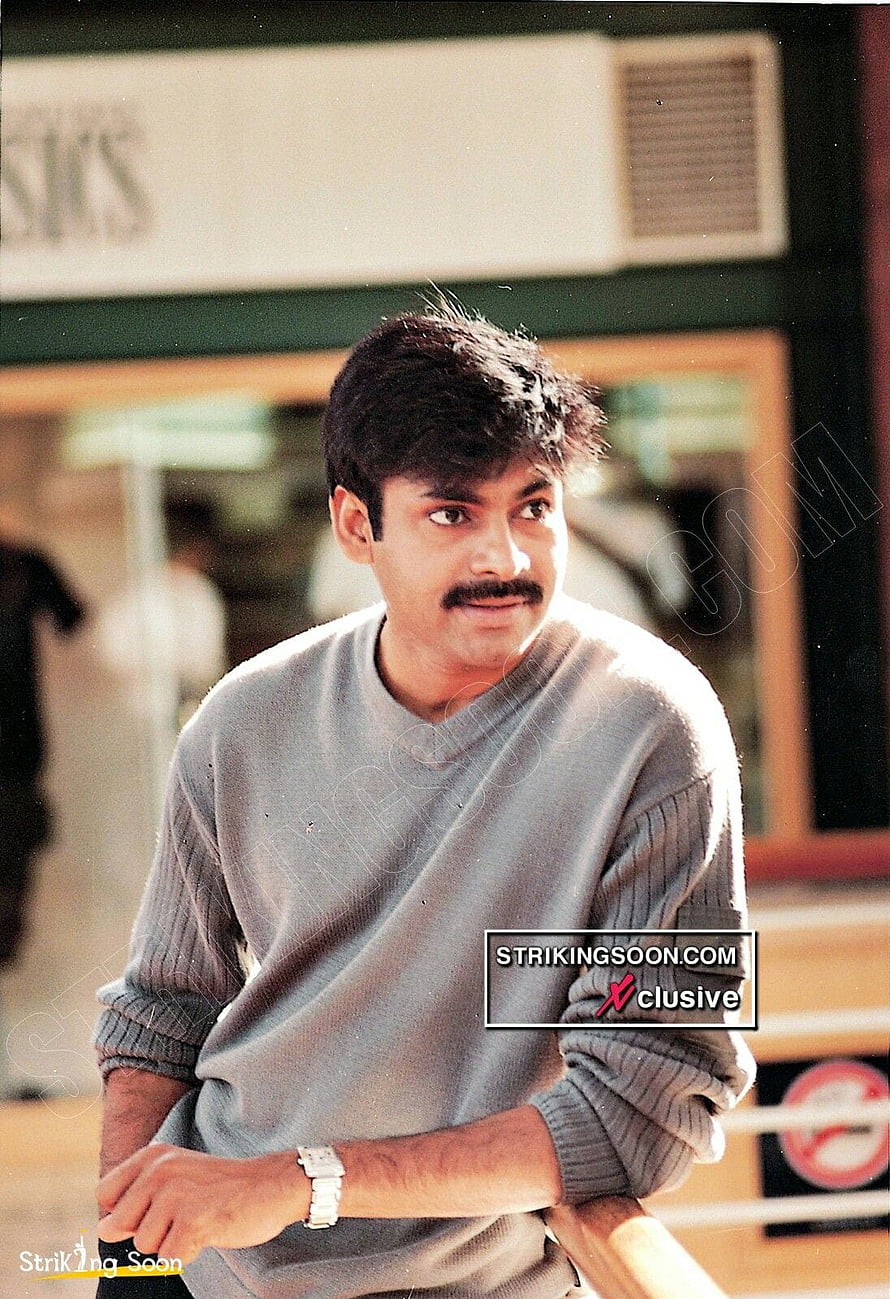 Ravi Teja in a Grey Sweater with a Mustache in a Vintage Portrait HD phone wallpaper