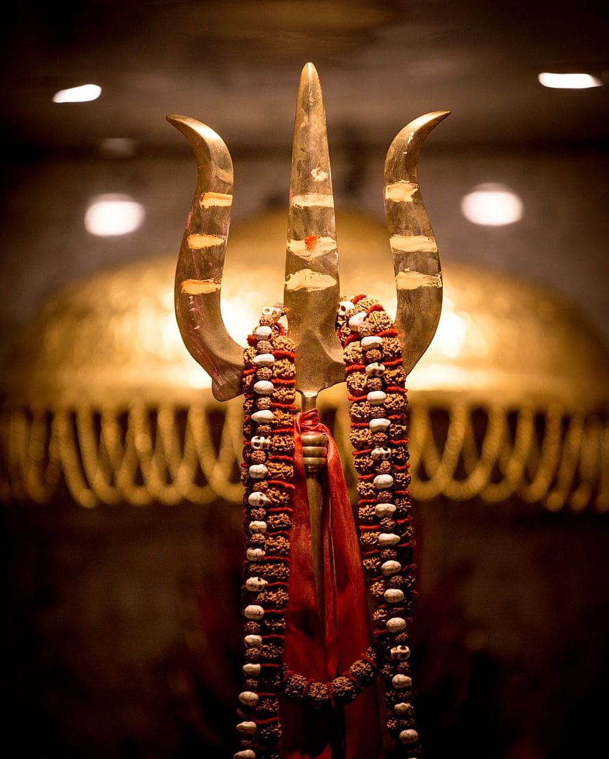 Ornate Shiva Trishula Adorned With Rudraksha Beads And Red Silk Ribbon HD phone wallpaper