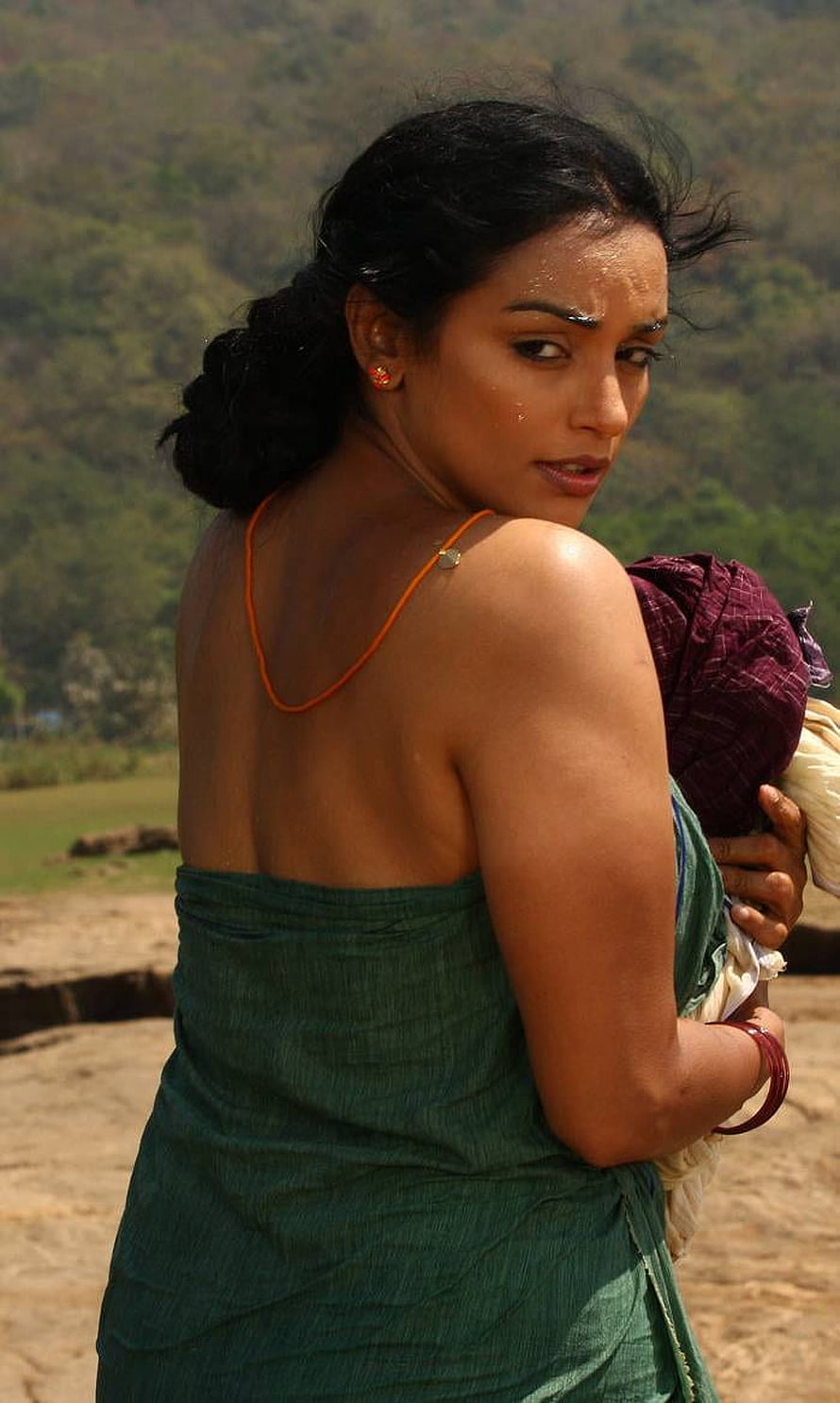 Swetha Menon in Green Saree with Baby Bundle in Rural Landscape HD phone wallpaper