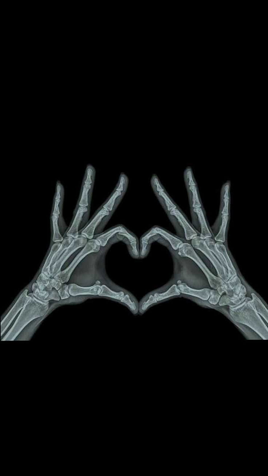 Skeletal Hands Forming Heart Shape in Dark Grunge Aesthetic Style HD phone wallpaper