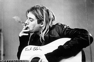Kurt Cobain Smoking While Playing Acoustic Guitar in Black and White HD wallpaper