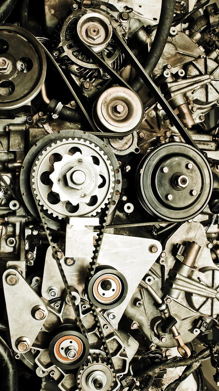 Close-Up of Car Engine Timing Belt, Pulleys, and Mechanical Components HD phone wallpaper