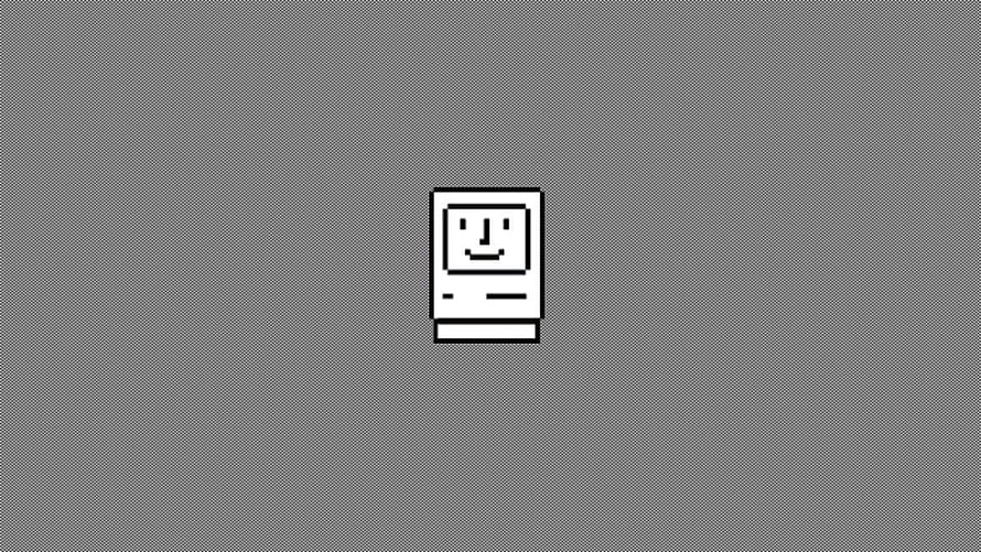 Classic Macintosh Computer Icon on Gray Background HD wallpaper