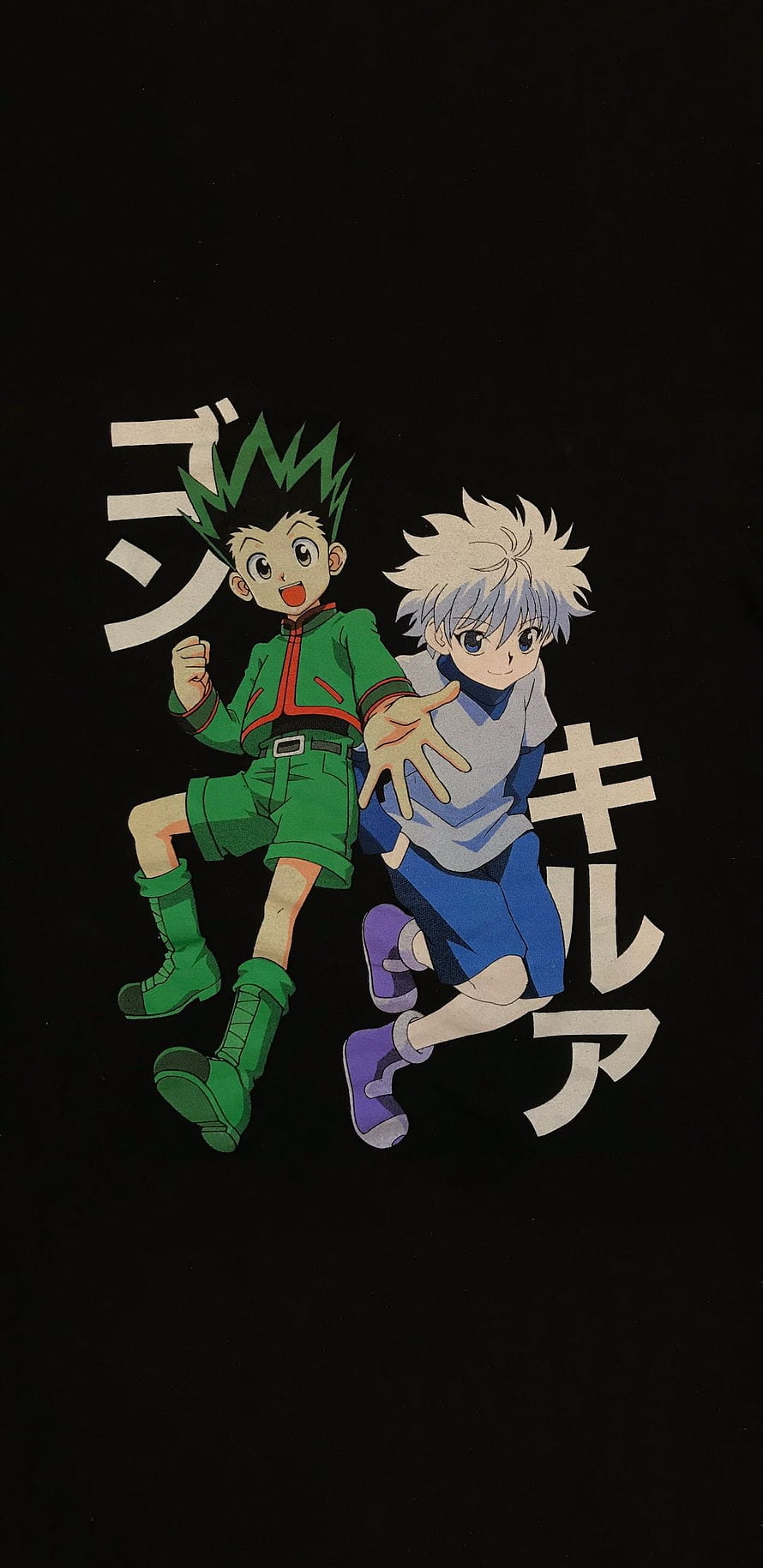 Gon and Killua from Hunter x Hunter in a dynamic running pose on a black background HD phone wallpaper