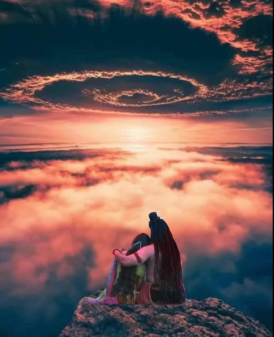 Lord Shiva and Parvati Silhouette on a Mountain Peak Above a Sea of Clouds at Sunset HD phone wallpaper
