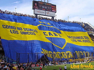 Boca Juniors Stadium Banner With Blue And Yellow Club Crest And Fan Chants HD wallpaper