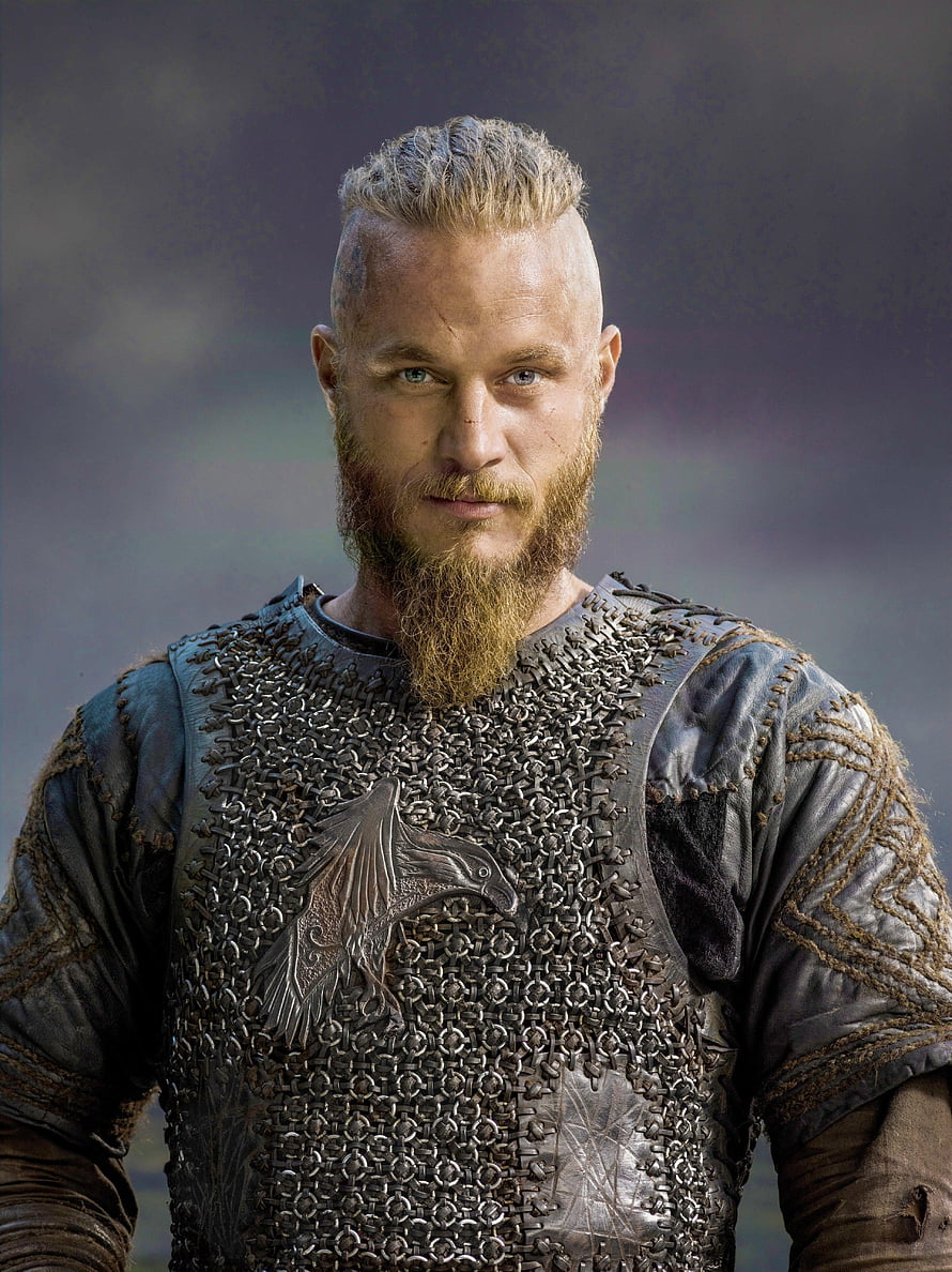 Ragnar Lothbrok in Viking Chainmail Armor with Eagle Emblem and Distinctive Beard HD phone wallpaper