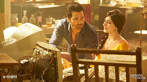 Sanam Teri Kasam Movie Still Featuring Actors in Warmly Lit Indoor Scene HD wallpaper