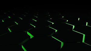 Glowing Green Hexagonal Grid on Black Background for Gaming Setup HD wallpaper