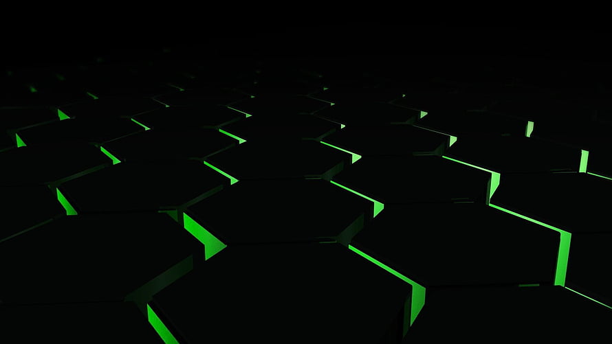 Glowing Green Hexagonal Grid on Black Background for Gaming Setup HD wallpaper