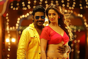 Raai Laxmi Movie Still Featuring Vibrant Yellow and Red Attire Against Bokeh Lights HD wallpaper