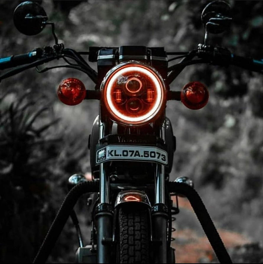 Front View of a Yamaha Motorcycle with Glowing Red Headlight and Turn Signals HD phone wallpaper