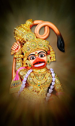 Kashtbhanjandev Temple Deity Portrait in Ornate Gold Attire and Jewelry HD phone wallpaper