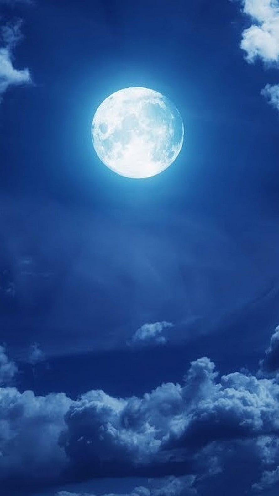 Luminous Full Moon Glowing in Deep Blue Sky with Dramatic Clouds HD phone wallpaper