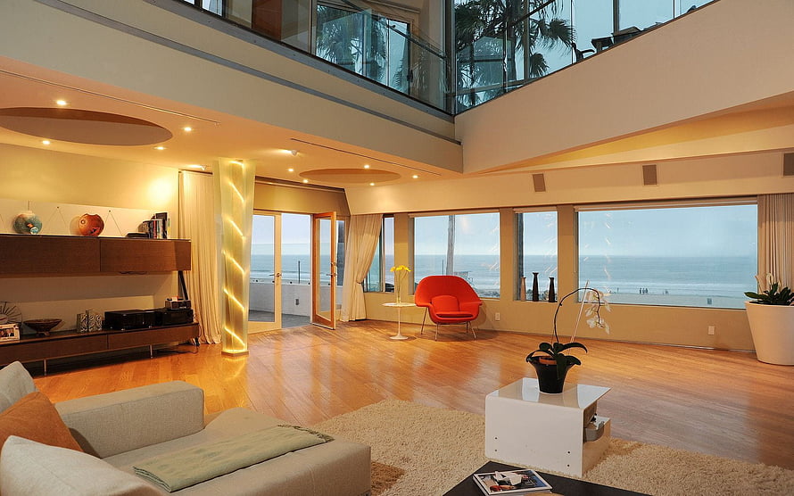 Modern Luxury Living Room With Ocean View And Warm Wood Flooring HD wallpaper