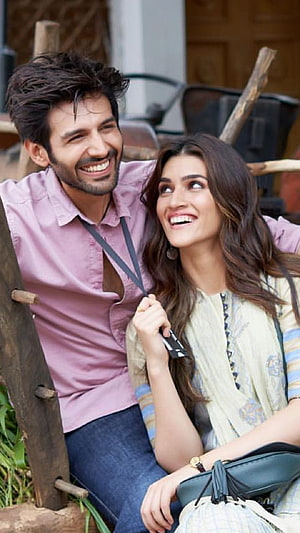 Bollywood Romantic Couple Sharing a Joyful Moment in a Rustic Outdoor Setting HD phone wallpaper