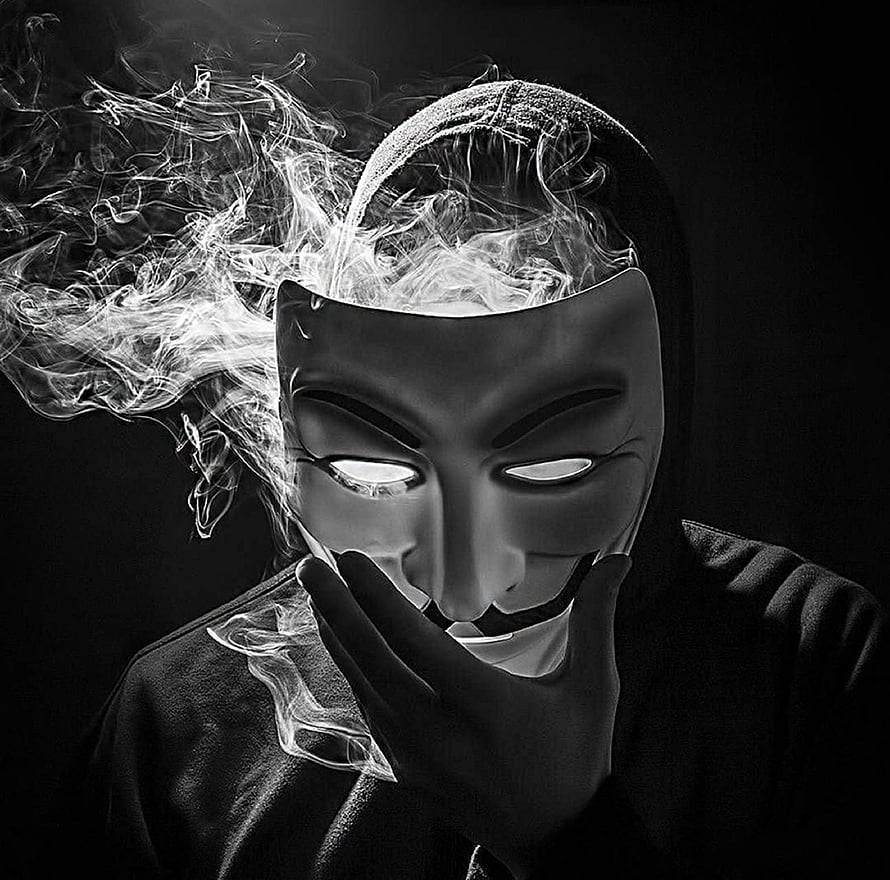 Anonymous Guy Fawkes Mask Portrait with Dramatic Smoke and Glowing Eyes HD wallpaper