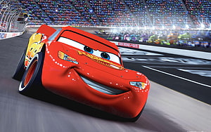 Lightning McQueen Racing on the Track in Disney Pixar Cars HD wallpaper