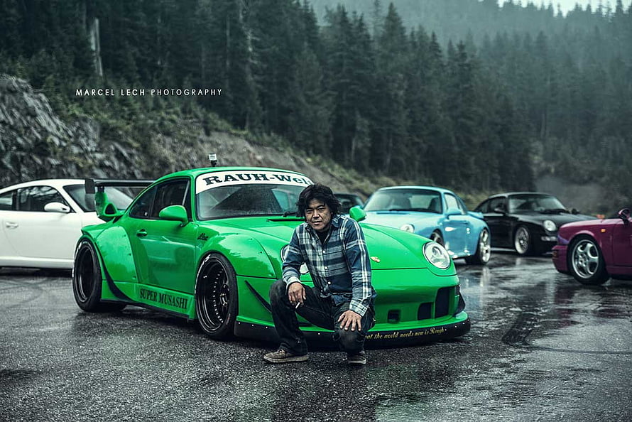 Akira Nakai with RWB Super Musashi Porsche 911 Widebody in Forest Setting HD wallpaper