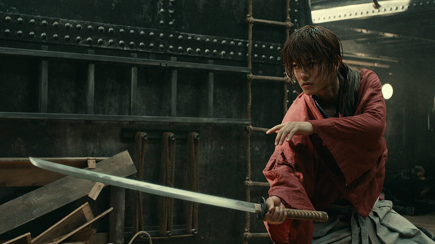 Rurouni Kenshin Movie Still: Swordsman in Red Kimono with Katana in Industrial Setting HD wallpaper