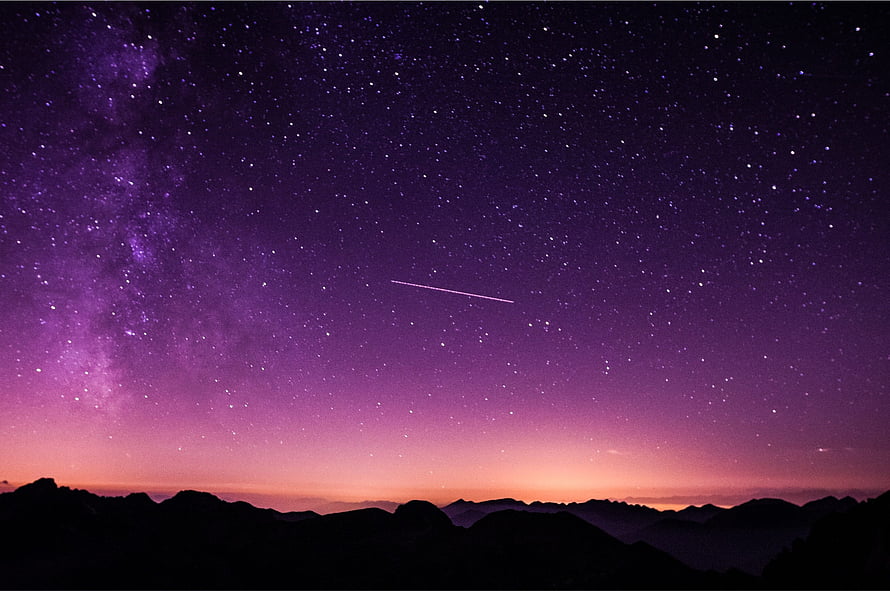 Purple Night Sky with Shooting Star and Milky Way Over Mountain Silhouette HD wallpaper