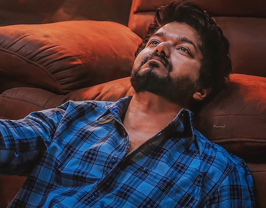 Vijay in Master Film Reclining on Leather Sofa in Blue Plaid Shirt HD wallpaper