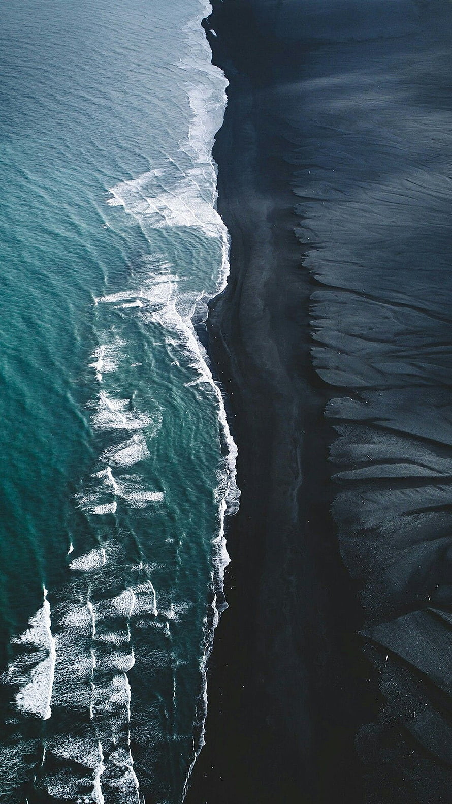 Aerial View of Black Sand Beach and Turquoise Ocean Waves in Iceland HD phone wallpaper