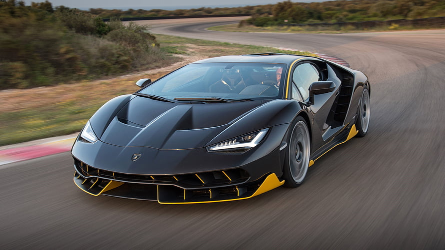 Black Lamborghini SC18 Alston with Yellow Accents on a Race Track HD wallpaper