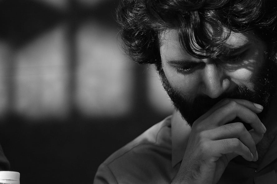 Arjun Reddy Black and White Portrait of a Bearded Man in Deep Thought HD wallpaper