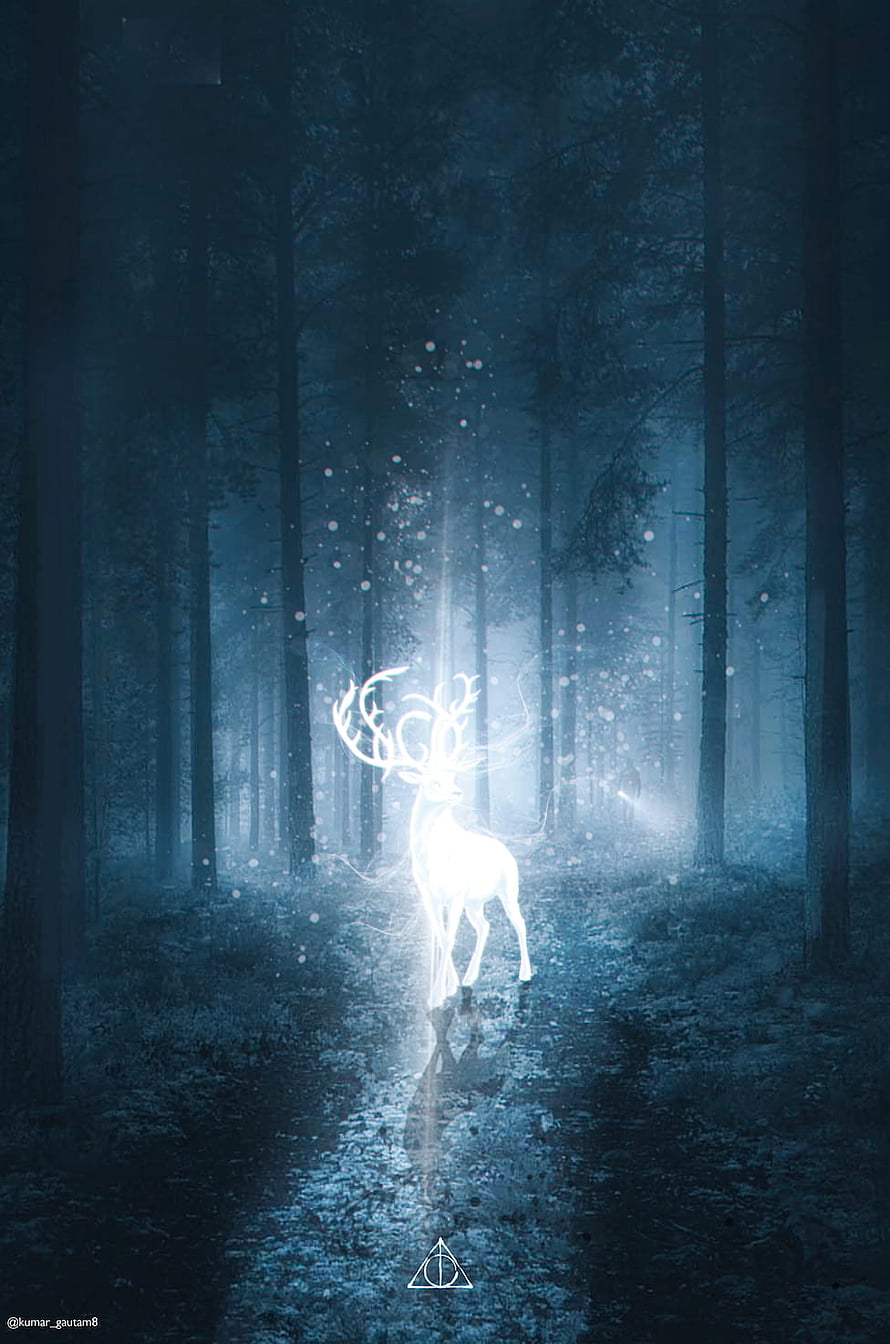 Harry Potter Patronus Deer in a Misty Forest with Glowing Light and Snow HD phone wallpaper
