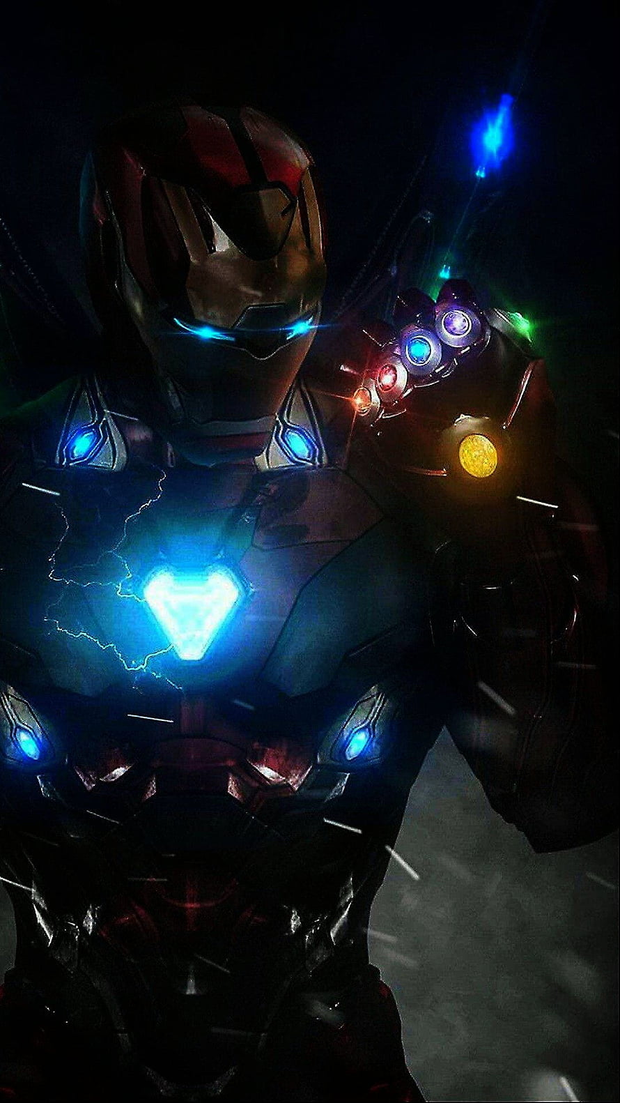 Iron Man in Dark Armor Wielding the Infinity Gauntlet with Glowing Arc Reactor HD phone wallpaper