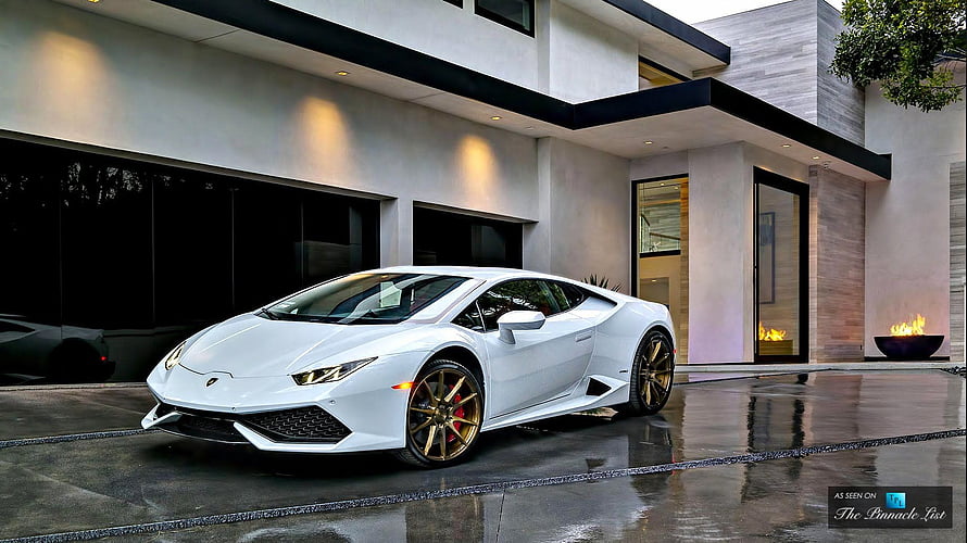 White Lamborghini Huracan with Gold Wheels Parked in Front of Modern Luxury Villa HD wallpaper