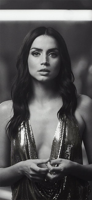 Ana de Armas in a shimmering sequined gown captured in a striking black and white portrait HD phone wallpaper