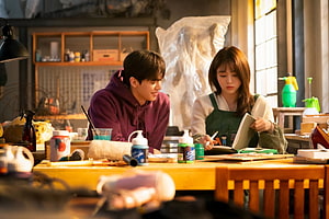 Nevertheless K-Drama Scene: Young Couple in Art Studio with Warm Lighting HD wallpaper