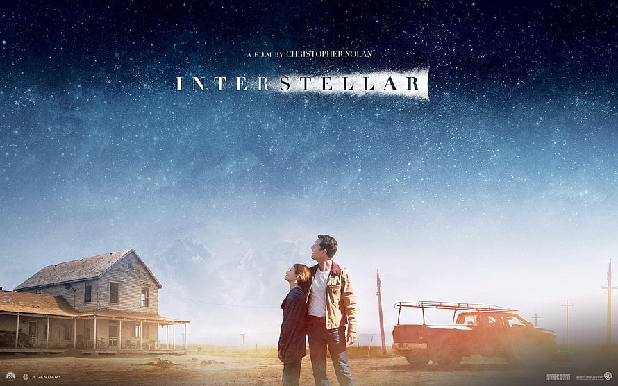Interstellar Movie Poster Featuring Matthew McConaughey and Jessica Chastain Under a Starry Sky HD wallpaper