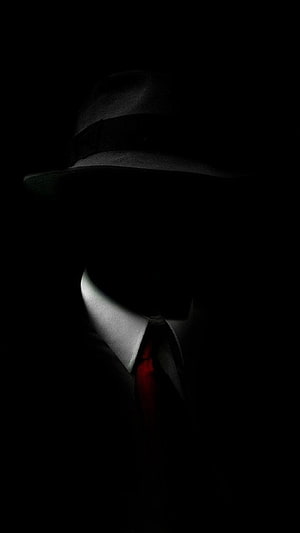 Mysterious Silhouette in Fedora and Red Tie Against Dark Background HD phone wallpaper