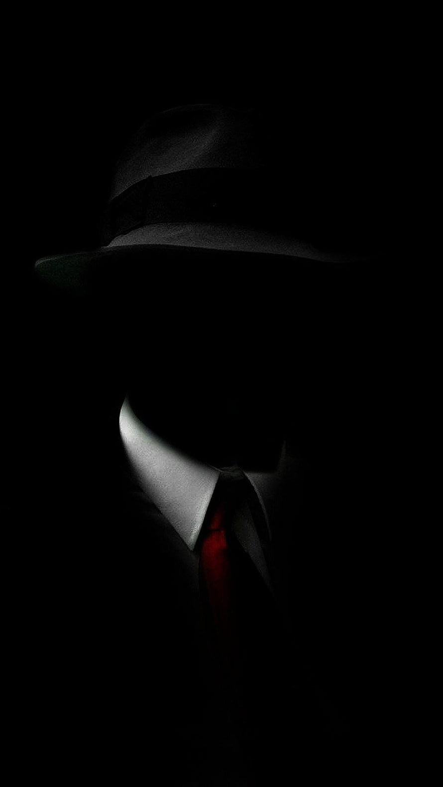 Mysterious Silhouette in Fedora and Red Tie Against Dark Background HD phone wallpaper