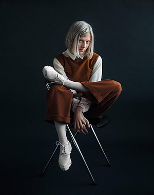 Aurora Aksnes Studio Portrait in Rust Trousers and White Platform Boots HD phone wallpaper