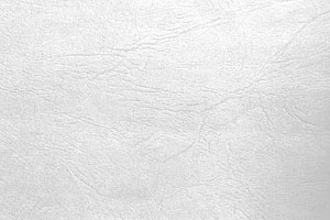 Minimalist White Leather Texture Background with Subtle Grain and Natural Creases HD wallpaper