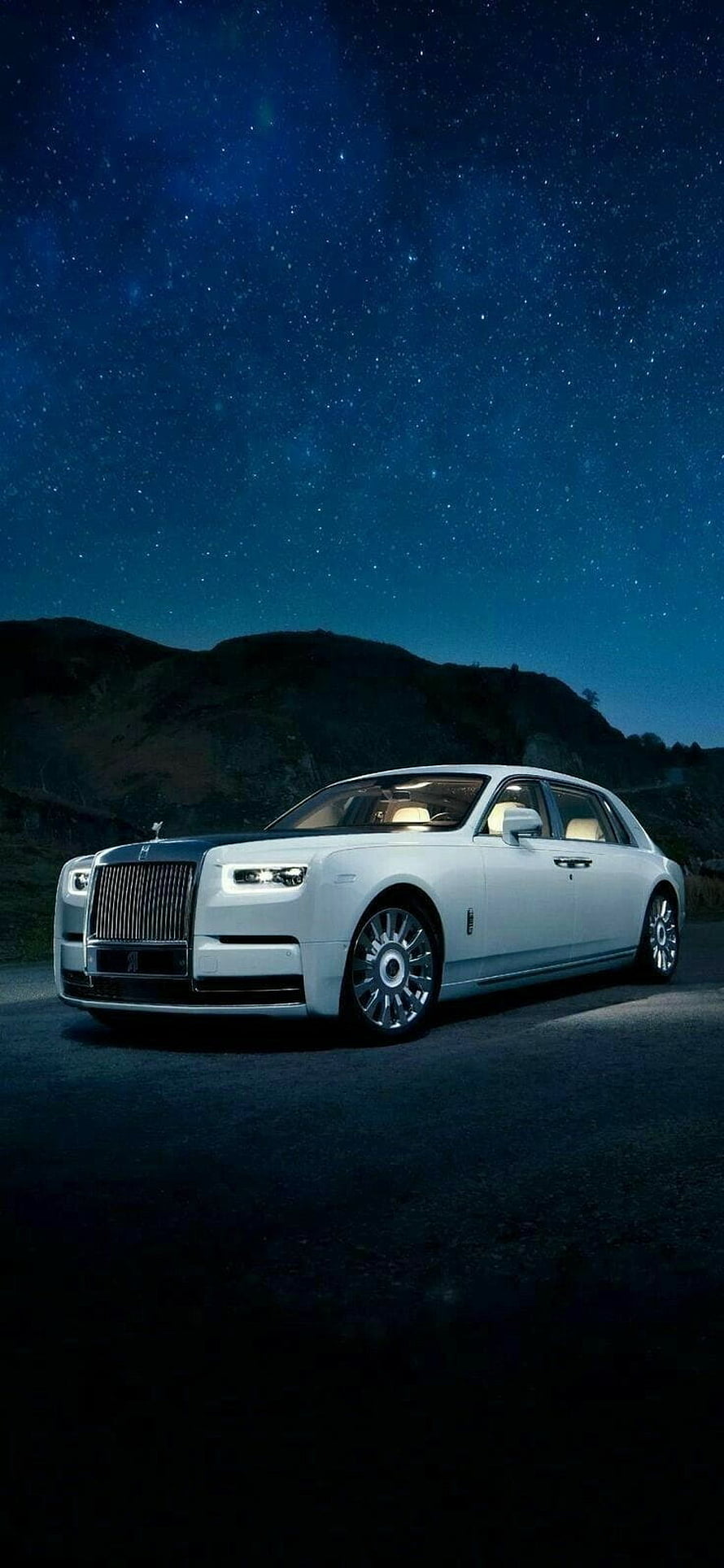 White Rolls Royce Ghost Luxury Sedan Parked Under a Starry Night Sky HD phone wallpaper