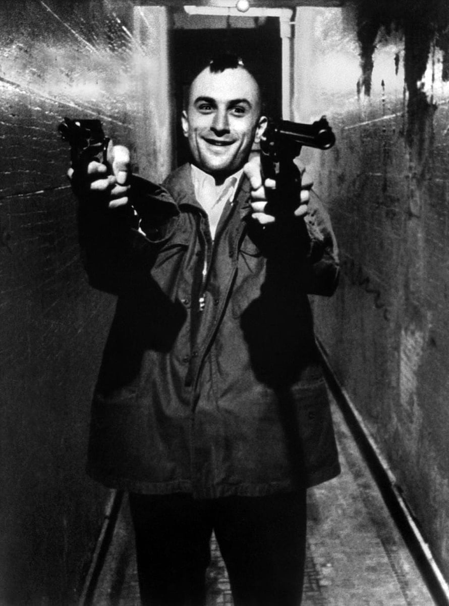 Robert De Niro as Travis Bickle in Taxi Driver Holding Dual Pistols in a Dark Alleyway HD phone wallpaper