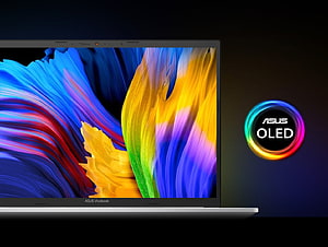 ASUS VivoBook Pro 14 OLED Laptop Displaying Vibrant Abstract Artwork on Dark Background HD wallpaper