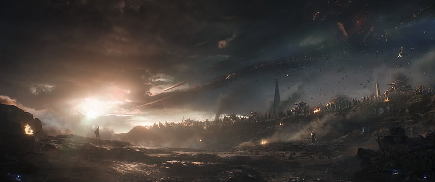 Avengers Endgame Final Battle Scene with Epic Skyline and Dramatic Lighting HD wallpaper