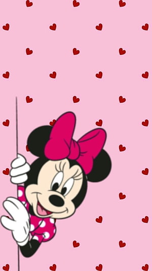 Minnie Mouse Peeking Through a Pink Heart Patterned Background HD phone wallpaper