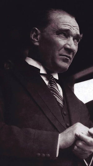 Mustafa Kemal Ataturk in a Formal Three-Piece Suit and Striped Tie HD phone wallpaper