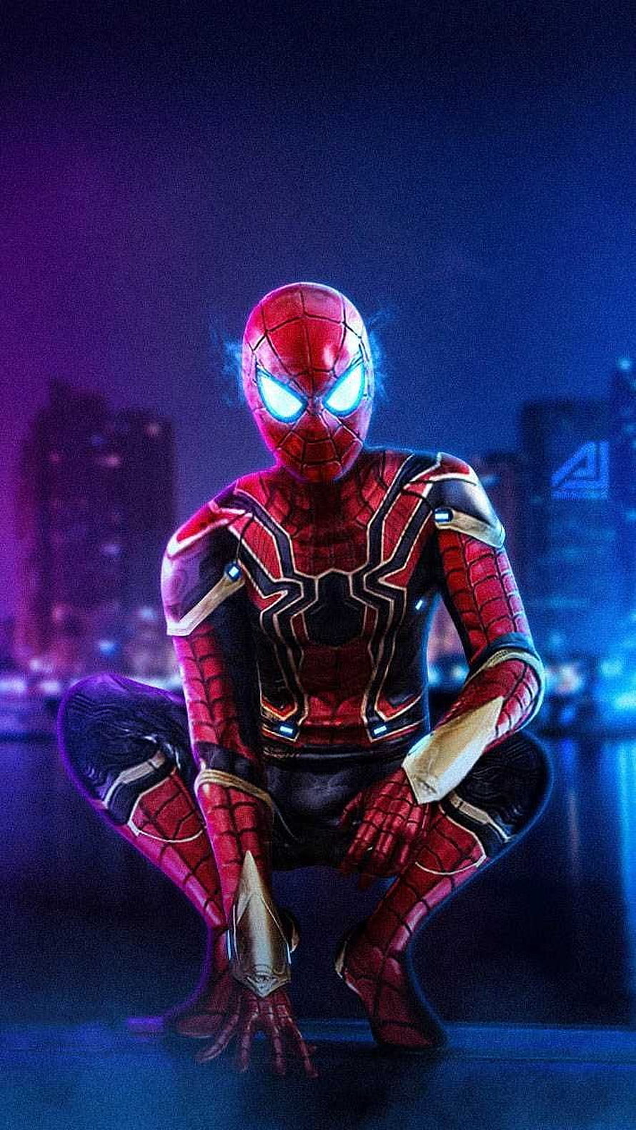 Spider-Man in Iron Spider Armor Crouching on a Rooftop at Night HD phone wallpaper