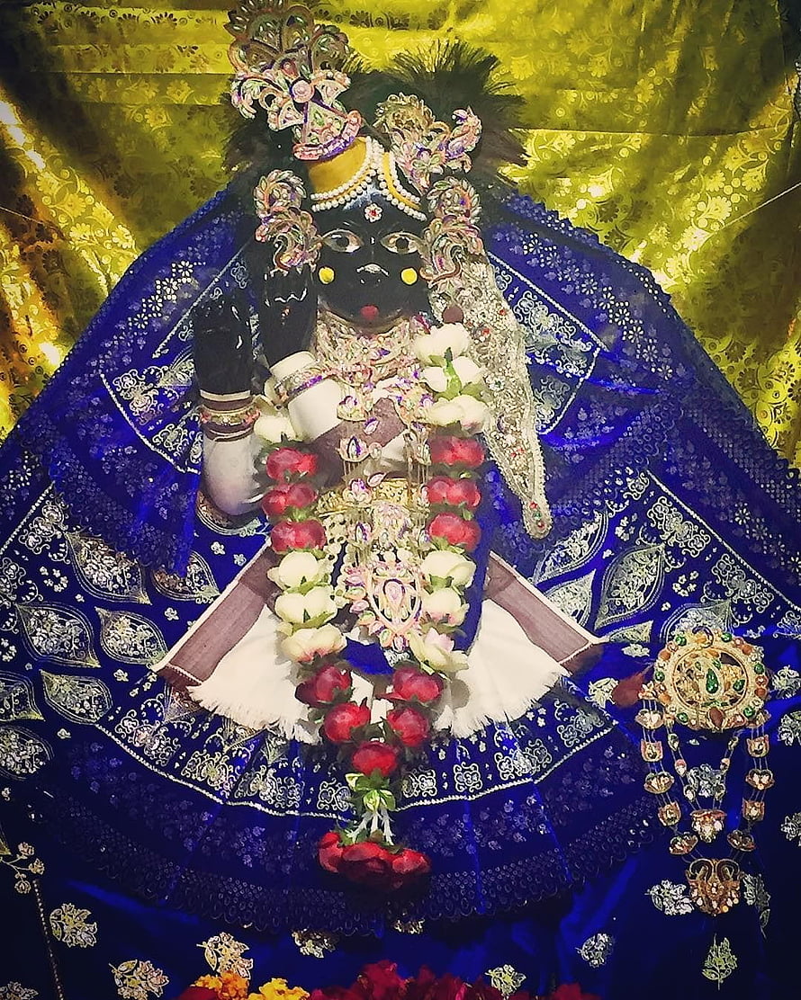 Bihar Baba Ji Murti Adorned in Royal Blue Silk and Floral Garlands HD phone wallpaper