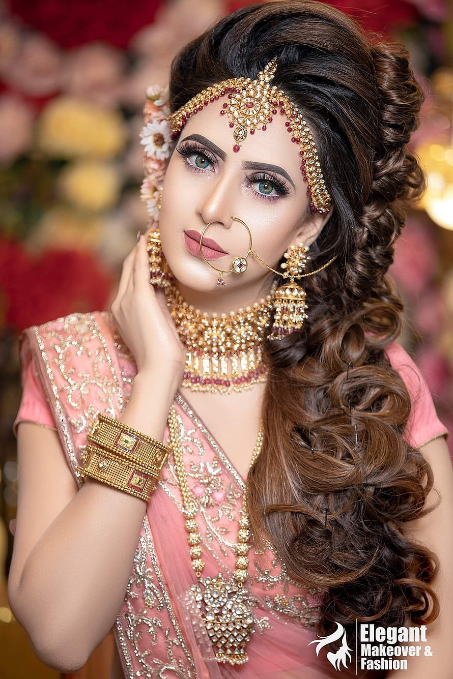 Bridal Portrait in Pink Saree with Gold Jewelry and Floral Hair HD phone wallpaper