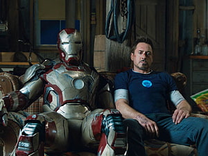 Iron Man and Tony Stark Sitting Together in Workshop Scene HD wallpaper